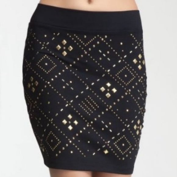 bebe Dresses & Skirts - BEBE Bodycon Miniskirt Small Black Semistretch Gold colored Accents